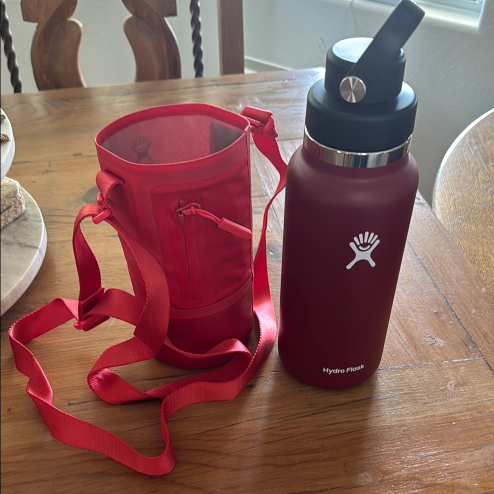 Hydro Flask Red Water Bottle with Red Carry Sleeve